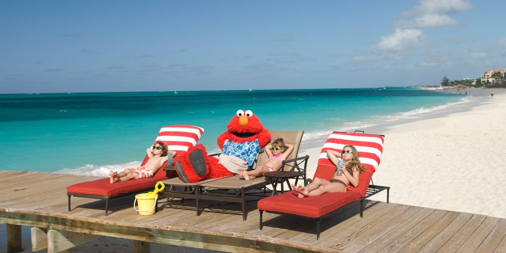 elmo and kids on deck chairs