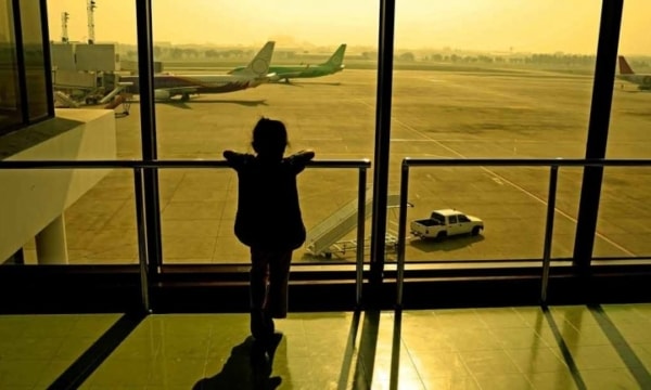 Girl looking at planes