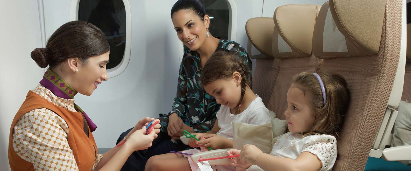 Etihad's flying nanny with two girls and their mum onboard a plane