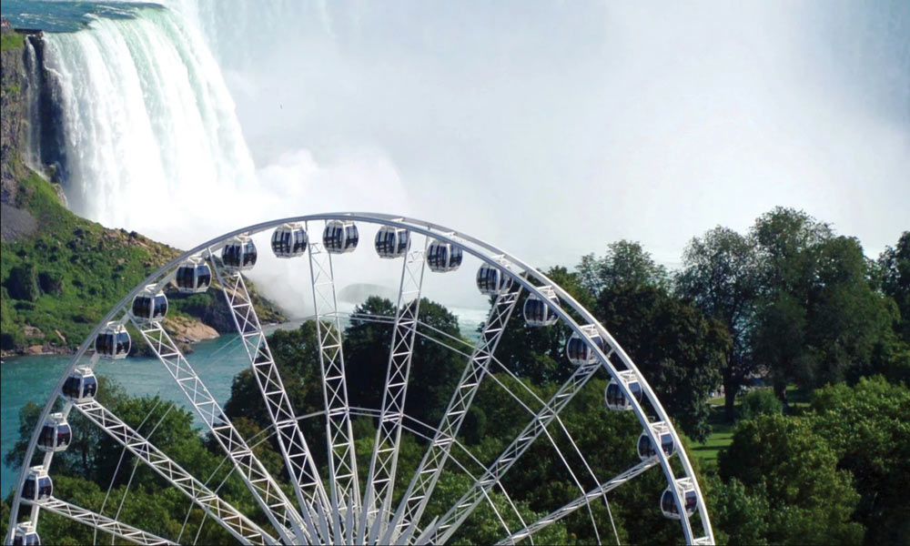 Clifton-Hill-giant-ferris-wheel-with-niagara-falls-in-background-canada