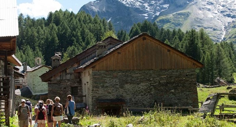 chalet in french alps with mountains in background