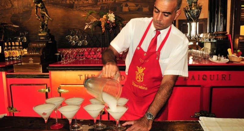Man pouring out cocktails