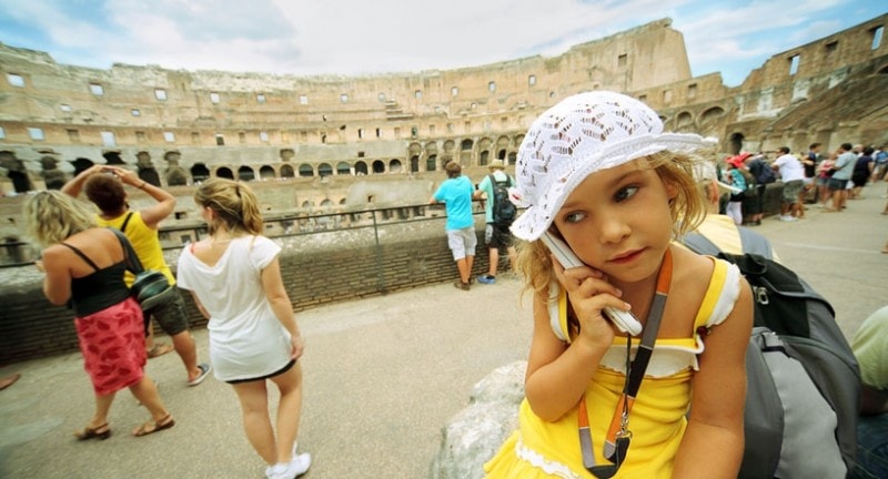 A girl in front of the colosseum