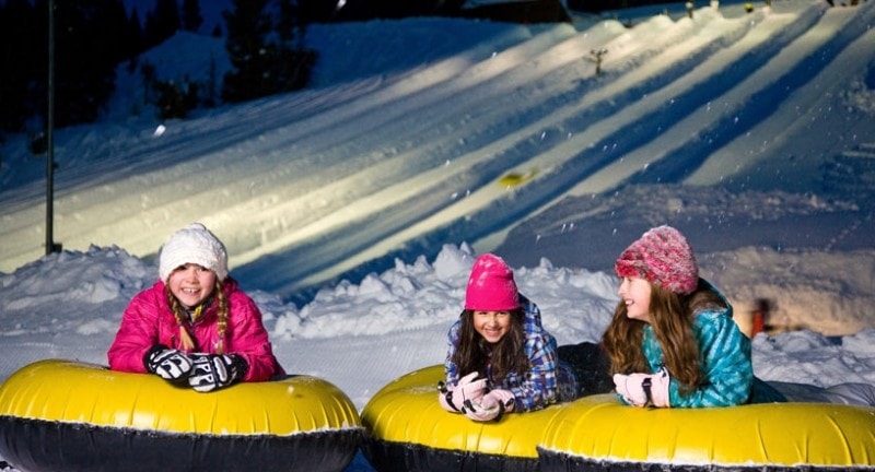 children play in snow at vail colorado