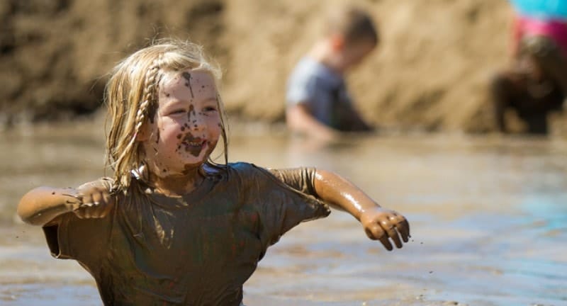 muddy child in young mucker race
