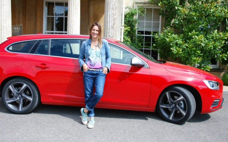 A mother enjoying the Volvo V60 during a weekend getaway