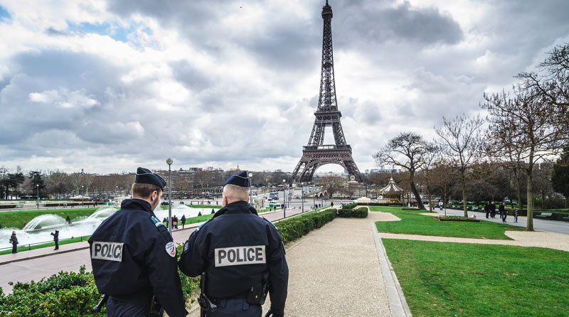 paris-eiffel-tower-with-french-police-in-foreground