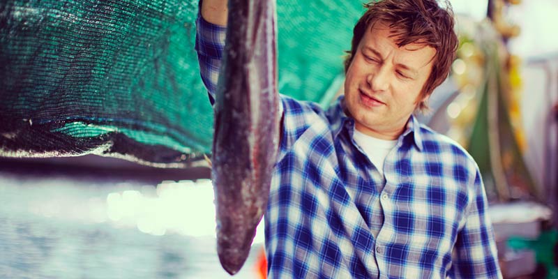 jamie-oliver-holding-a-fish