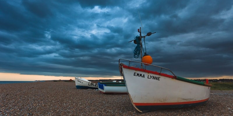 small-fishing-boats-on-shore-cley-norfolk-best-beaches-in-England-2022