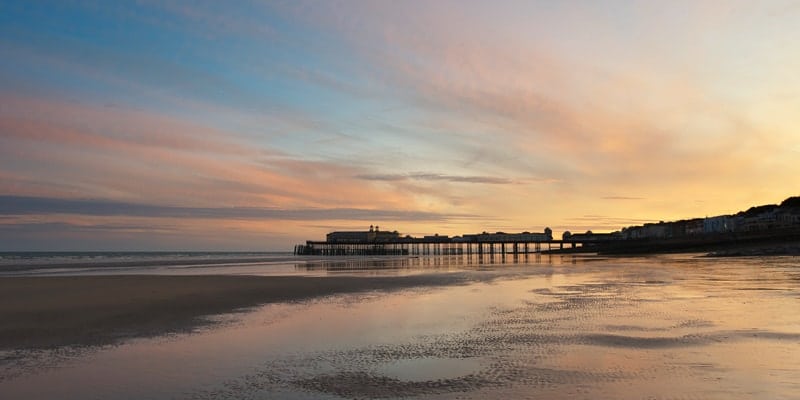 victorian-pier-on-hastings-beach-sunset-on-one-of-the-best-beaches-in-england