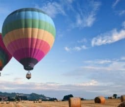 feature image hot air balloons over field in uk