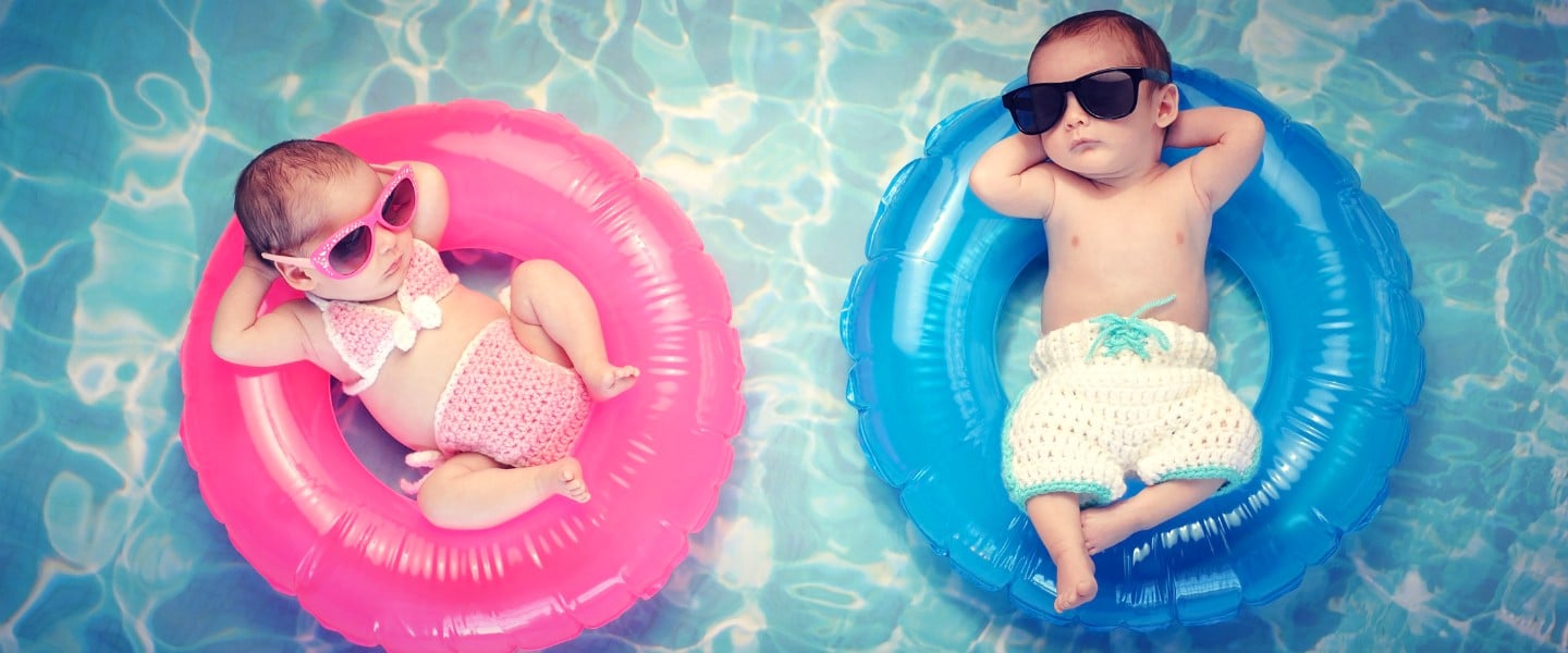 babies on inflatables in pool