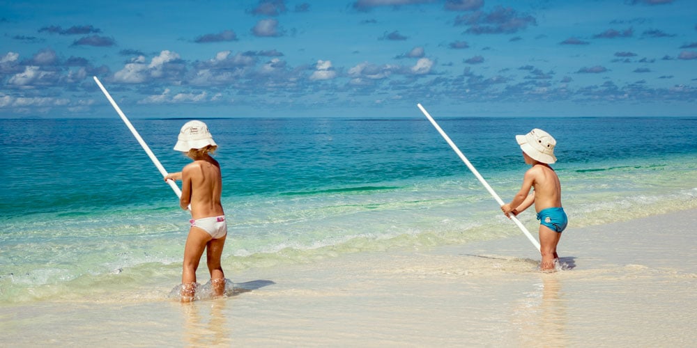 denis-private-island-seychelles-resort-indian-ocean-children-fishing-white-beach-luxury-family-holidays-2022