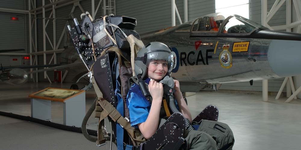 boy-in-ejector-seat-simulator-canada-aviation-and-space-museum-ottawa