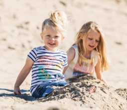 little-girls-on-beach-cornwall-beach-retreats-feature-image