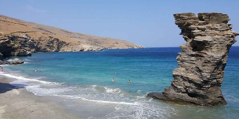 people-swimming-sea-stacks-andros-cyclades-greek-islands-2022