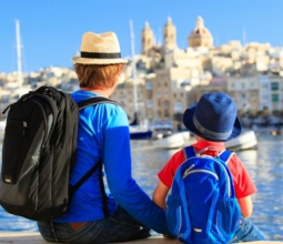 father and son looking at city of Valetta, Malta, family travel